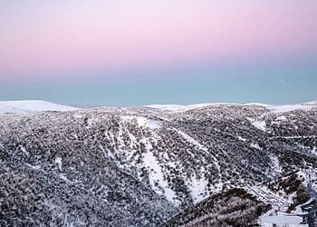 Sunset at Falls Creek - pastel pink and blue sky over mountains and village