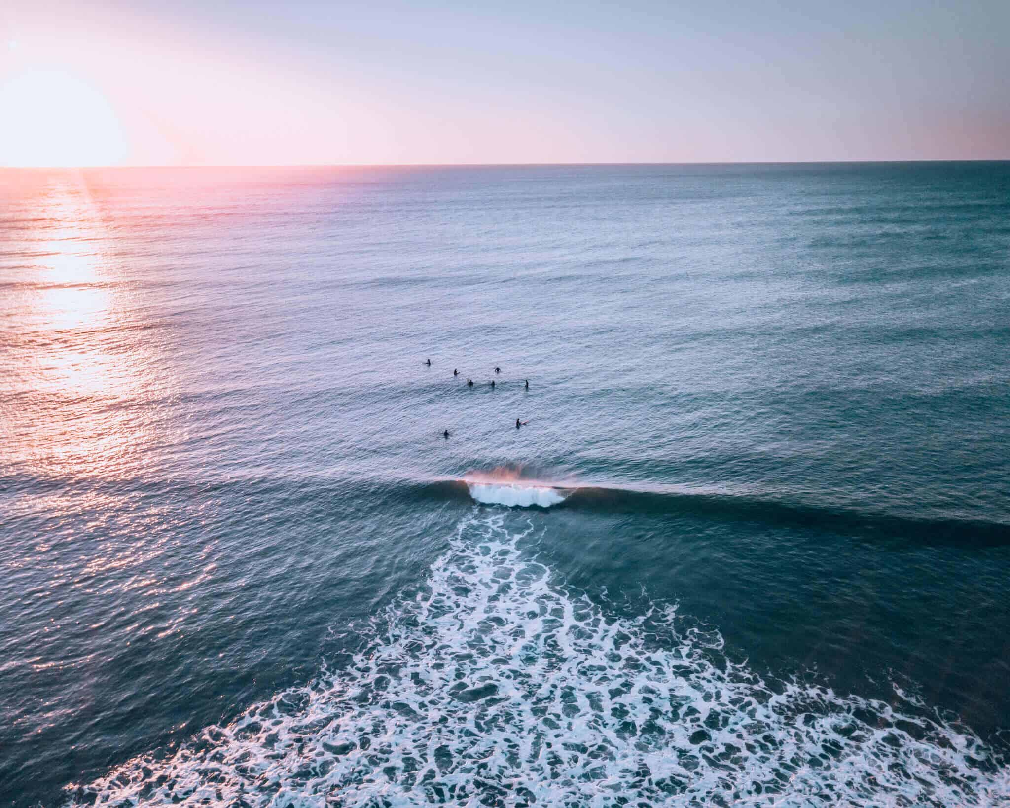 Port Noarlunga surfing at sunset