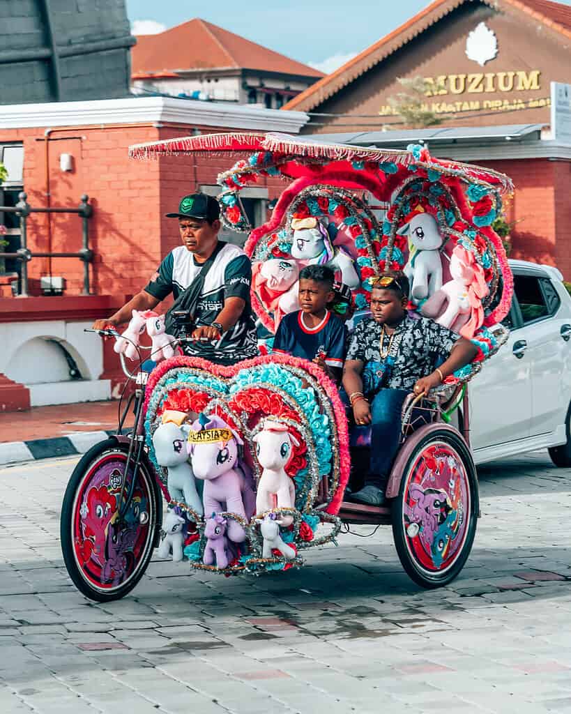 my little pony rickshaw with driver and two kids in Melaka
