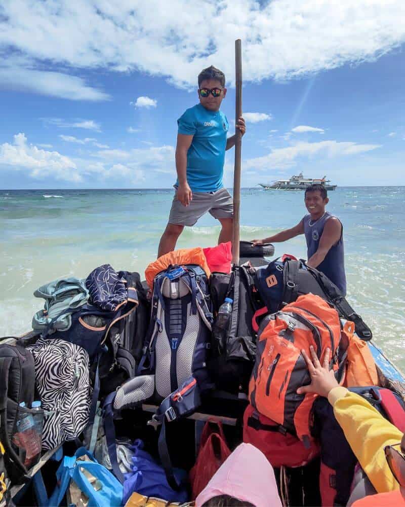 Transporting luggage to the Oslob ferry