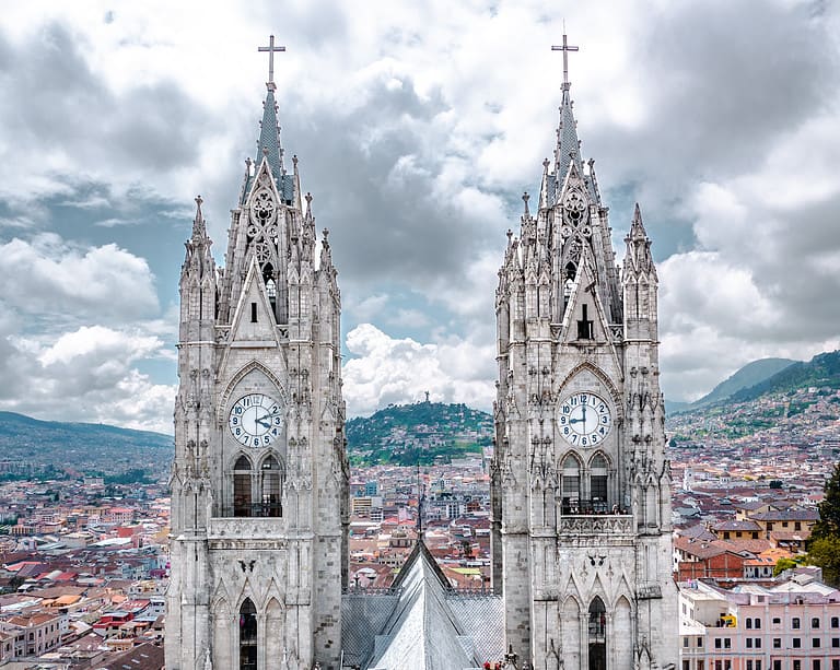 Basílica del Voto Nacional - Two symmetrical towers and city of Quito below
