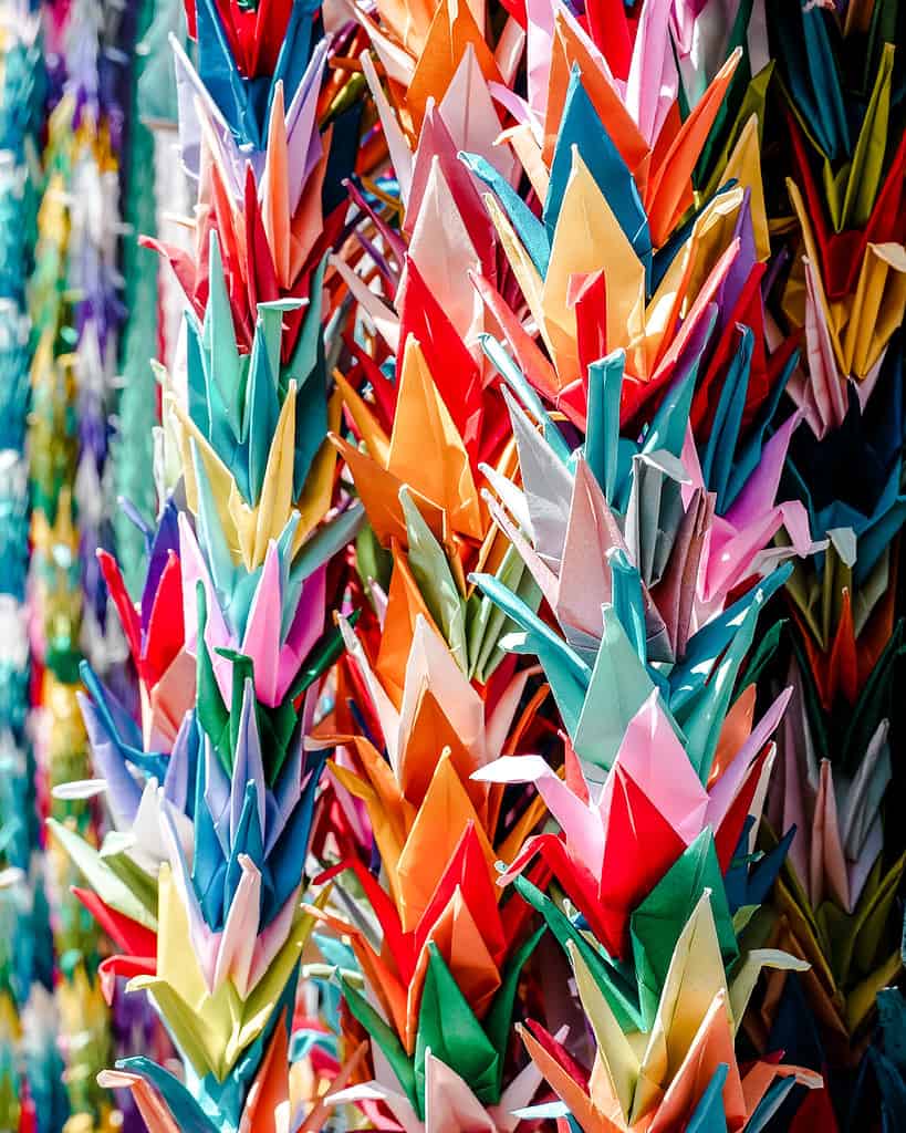 kyoto origami crane on string in rainbow colours